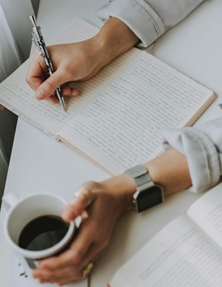 Writing in a notebook